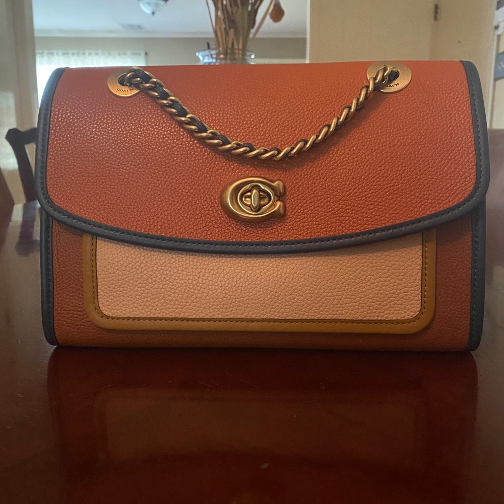 Night owl deal!!Coach Parker in vintage mauve multi. Used bag. Perfect for fall